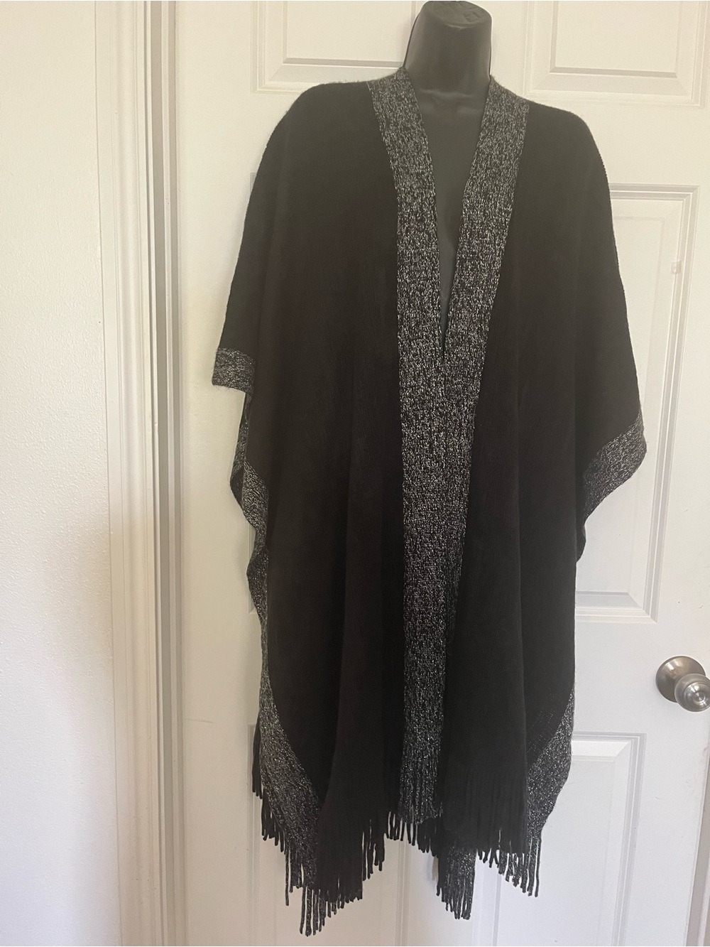 Black Fringe Knit Poncho with Silver Trim